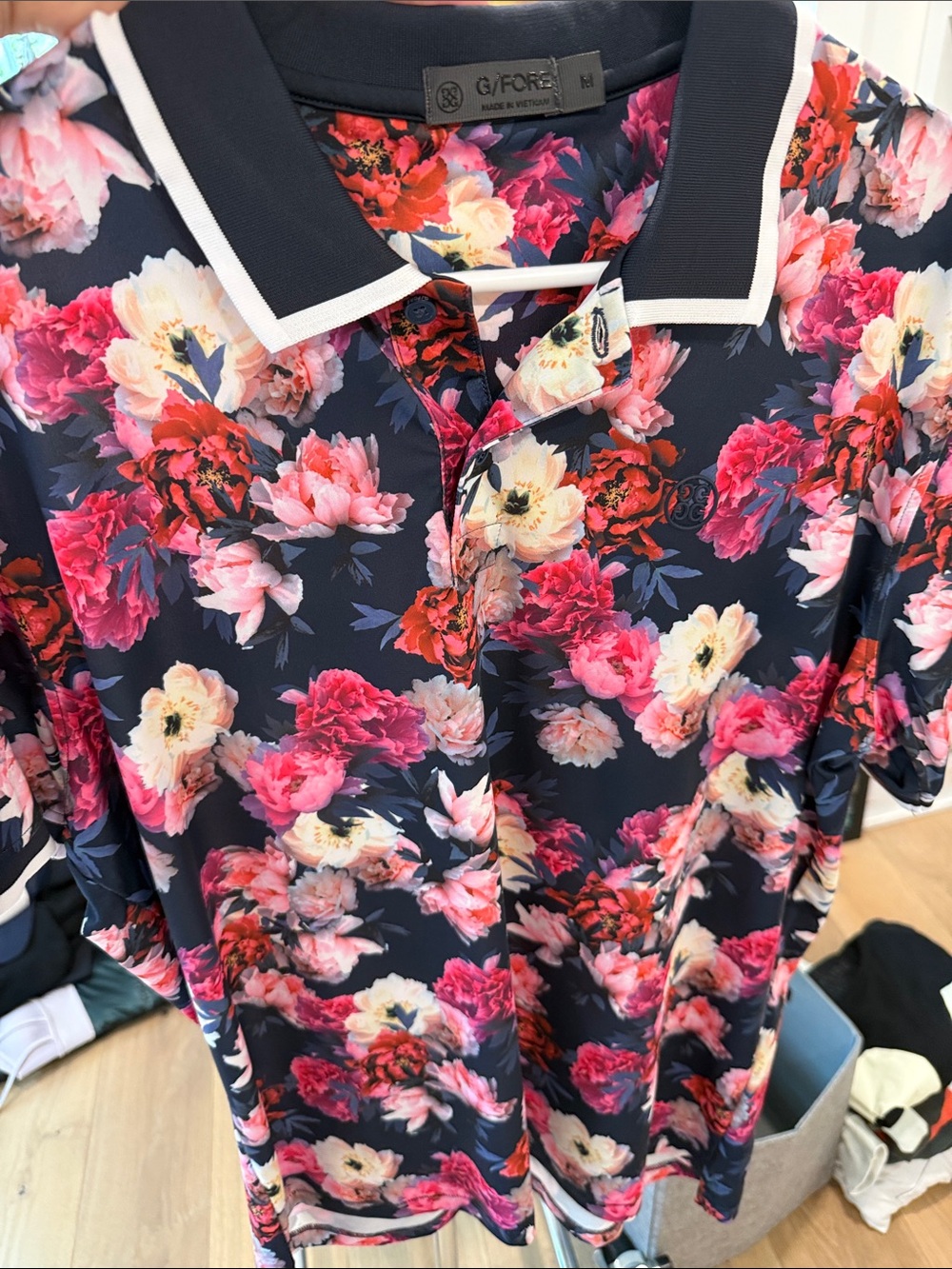 G/FORE Navy Floral Polo with Pink & Cream Blooms
